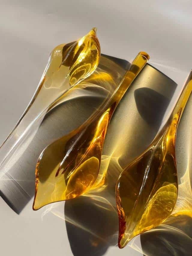 Illuminating Elegance: A Deep Dive into Chandelier Components 3 Amber Snake Head Glass Drops